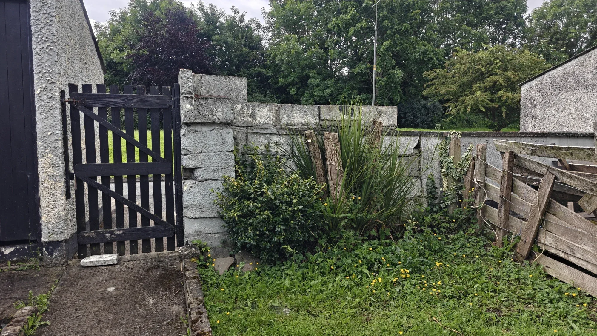 Block Wall Construction with Render Finish, before